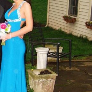 Form fitting and jeweled gown